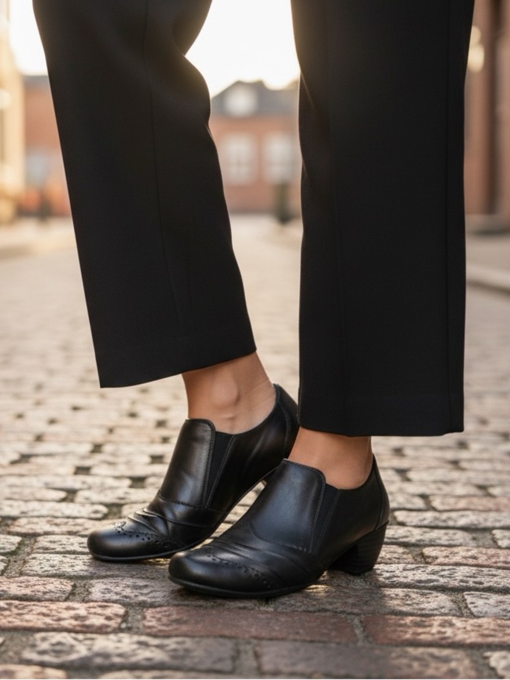 Rieker Black Leather Slip On Brogue Heel Booties